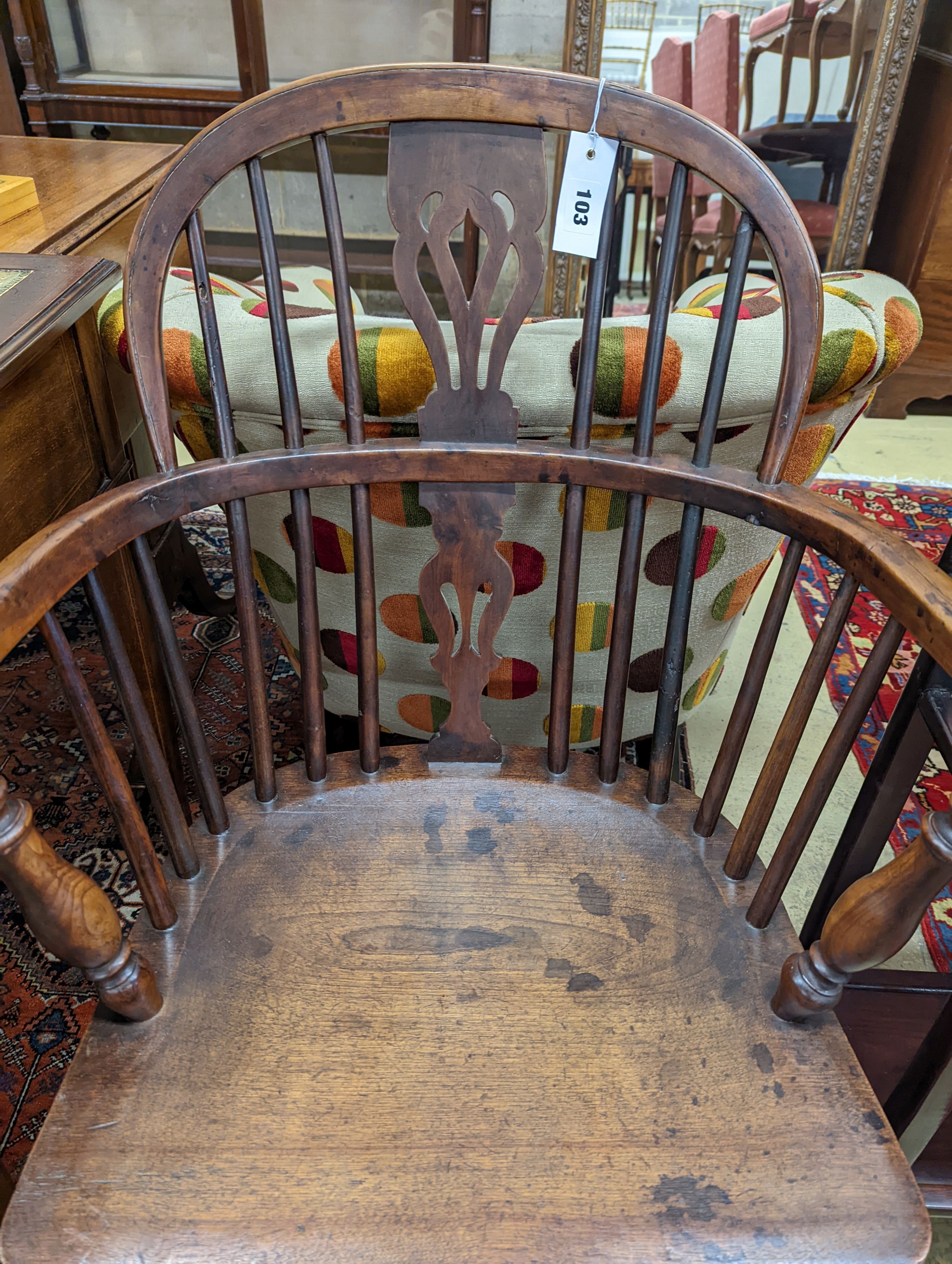 A mid 19th century Windsor yew and elm Windsor elbow chair, width 58cm, depth 42cm, height 91cm